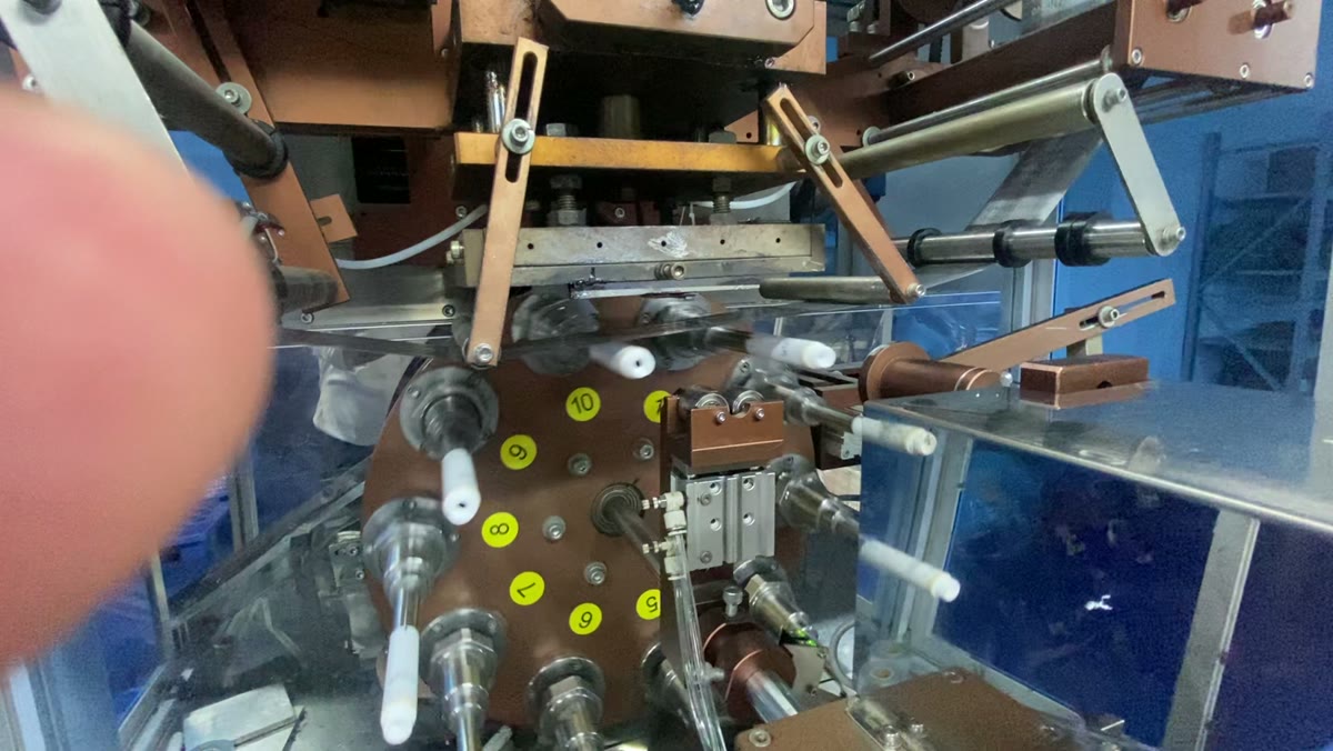 A close view of machinery on the tube production line